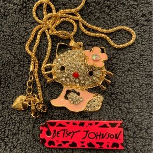 On sale! BJ Hello Kitty is waiting for Easter, apricot jumper w/ black ruffle.